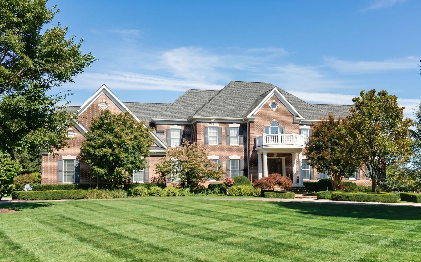 Well-maintained estate home with landscaped grounds