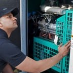 property manager inspecting generator