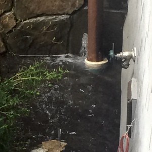 water bubbling downspout