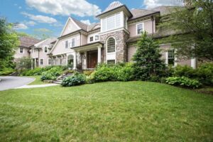 nice home with grass lawn