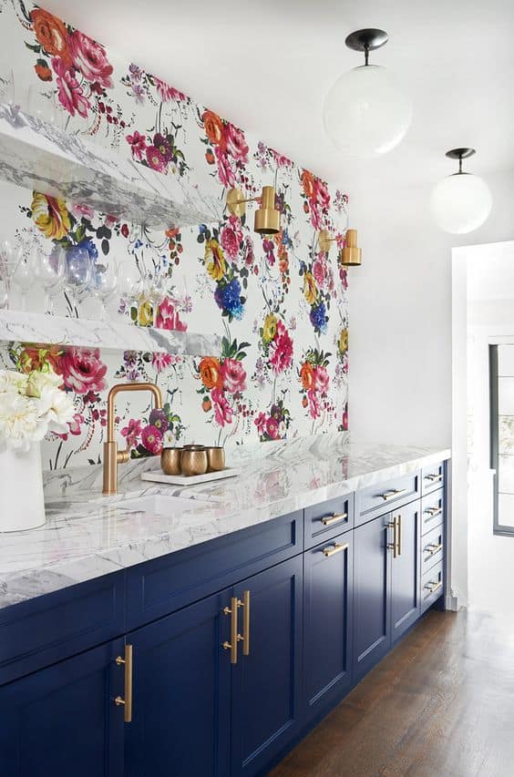 Flowery wallpaper backsplash in kitchen