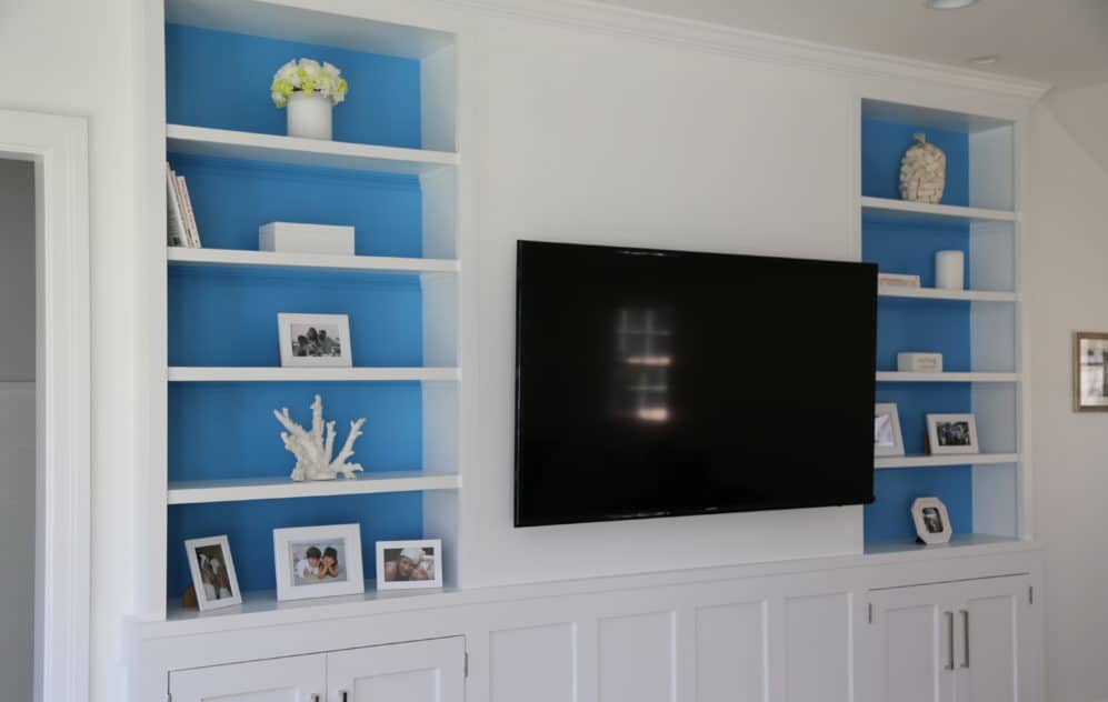 blue paint accents rear of bookcase