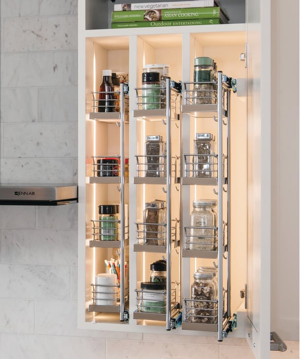 multiple pull out spice units in cabinet