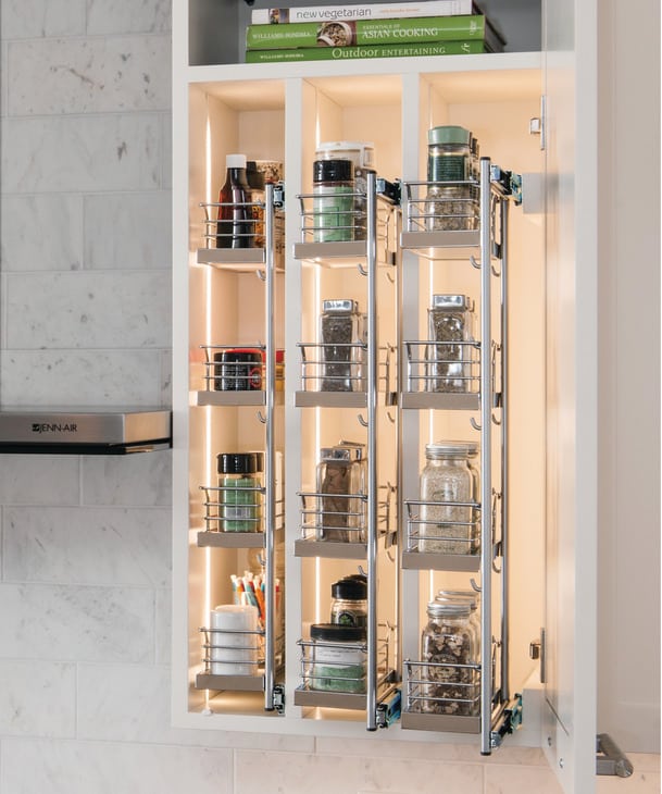 multiple pull out spice units in cabinet