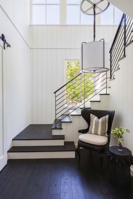 Farmhouse style shiplap panelling around staircase