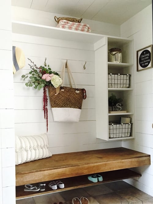 mudroom with horizontal shiplap wood panelling