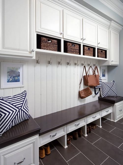 mudroom with vertical shiplap wood panelling