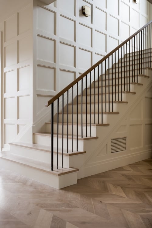 shaker style wood panelling staircase
