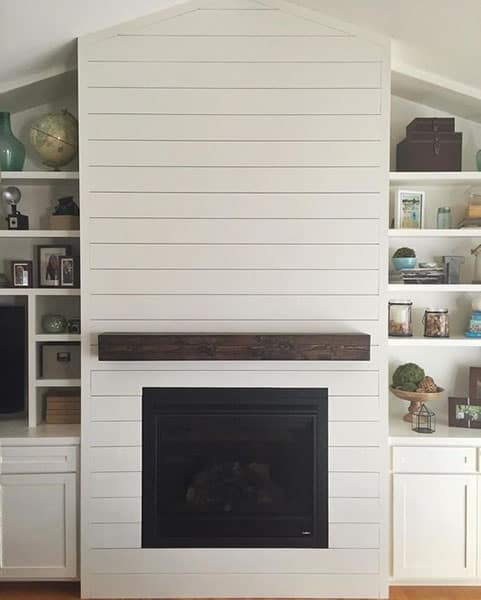 Stained rustic wood mantel