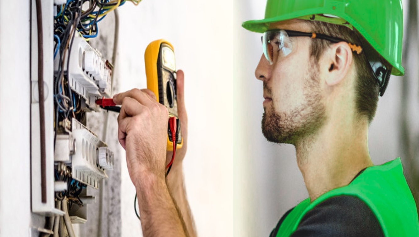 Electrician working on equipment
